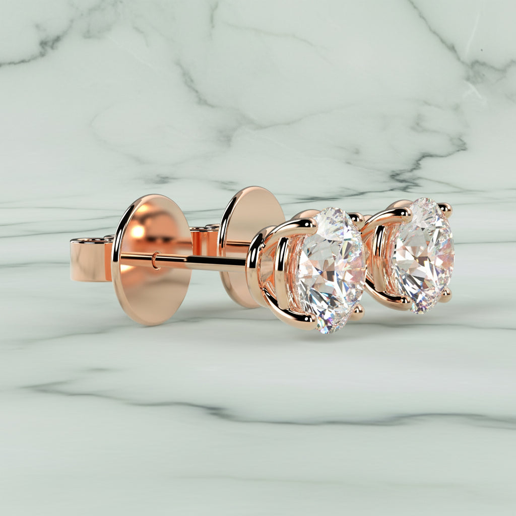 Rose gold earring with clear gemstones on a light beige background