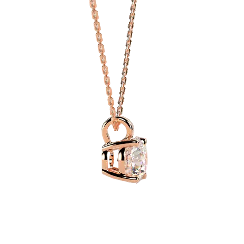 A rose gold necklace with a small geometric pendant featuring a clear rectangular gemstone, shown against a solid light beige background.