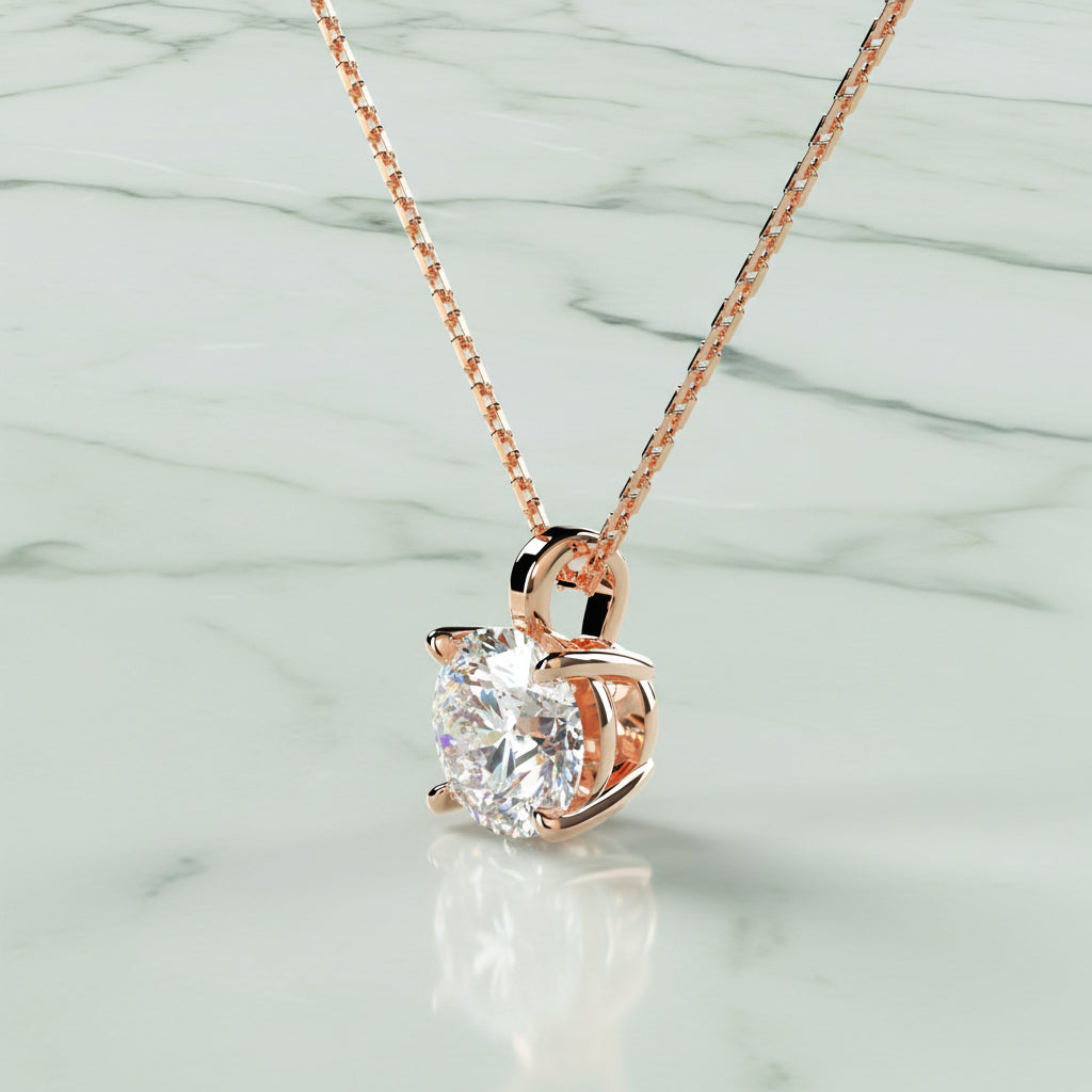 Rose gold necklace with a heart-shaped diamond pendant on a beige background