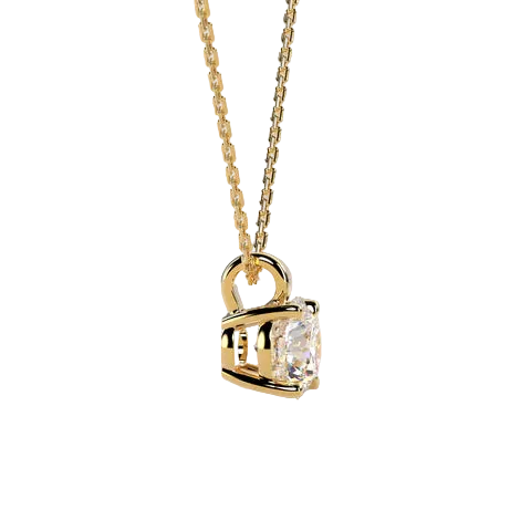 A gold necklace with a small pendant featuring a clear rectangular gemstone, shown against a soft beige background.
