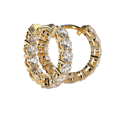 A pair of gold hoop earrings adorned with clear pavé-set round gemstones, displayed on a solid light beige background.