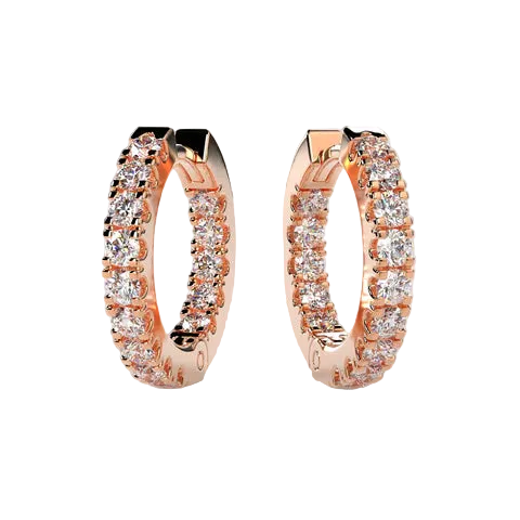 A pair of rose gold huggie hoop earrings adorned with rows of clear pavé-set gemstones, displayed on a neutral light beige background.