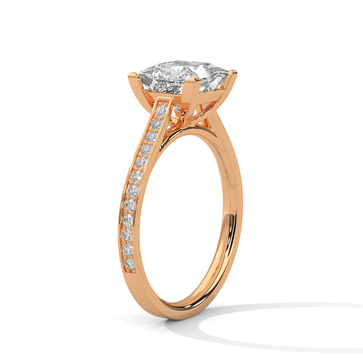 Rose gold ring with a large diamond and smaller diamonds on the band against a white background
