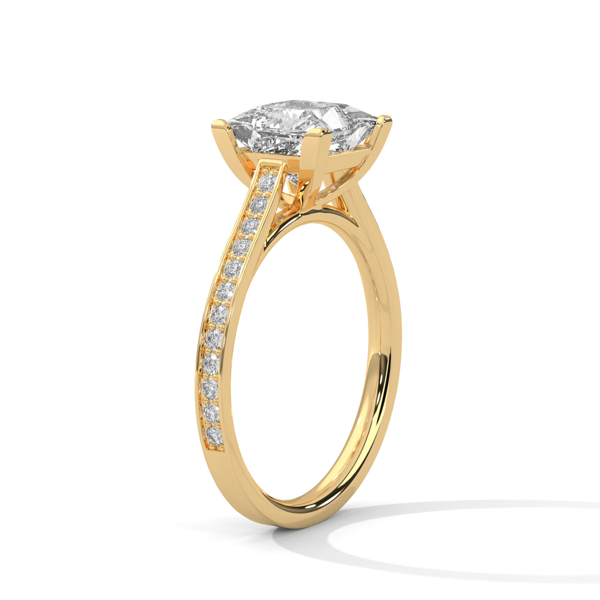 Gold ring with a large diamond and smaller diamonds on the band against a white background