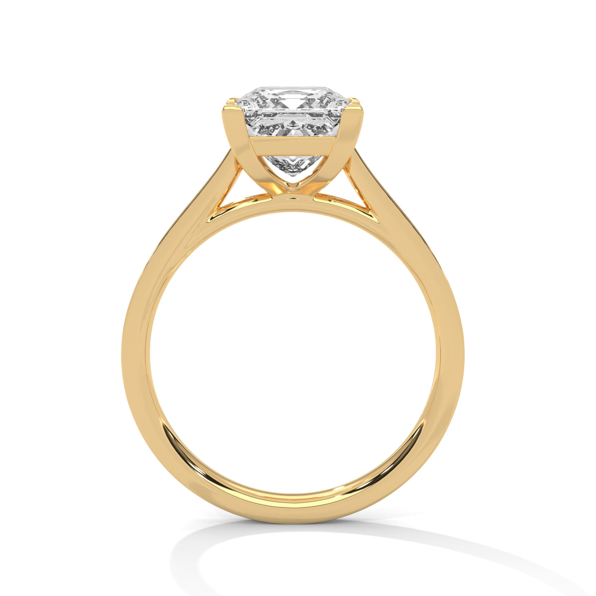 Gold ring with a diamond on a white background