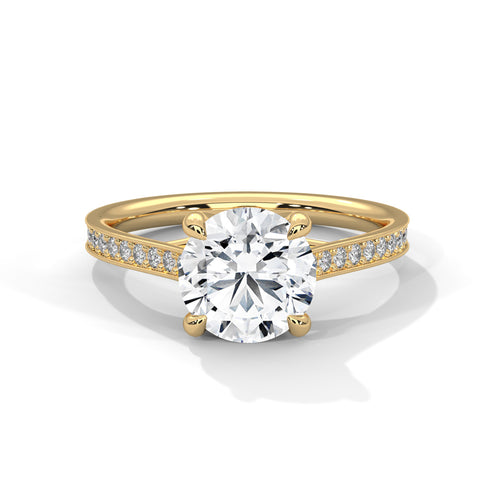 Gold ring with a large diamond and smaller diamonds on the band against a white background