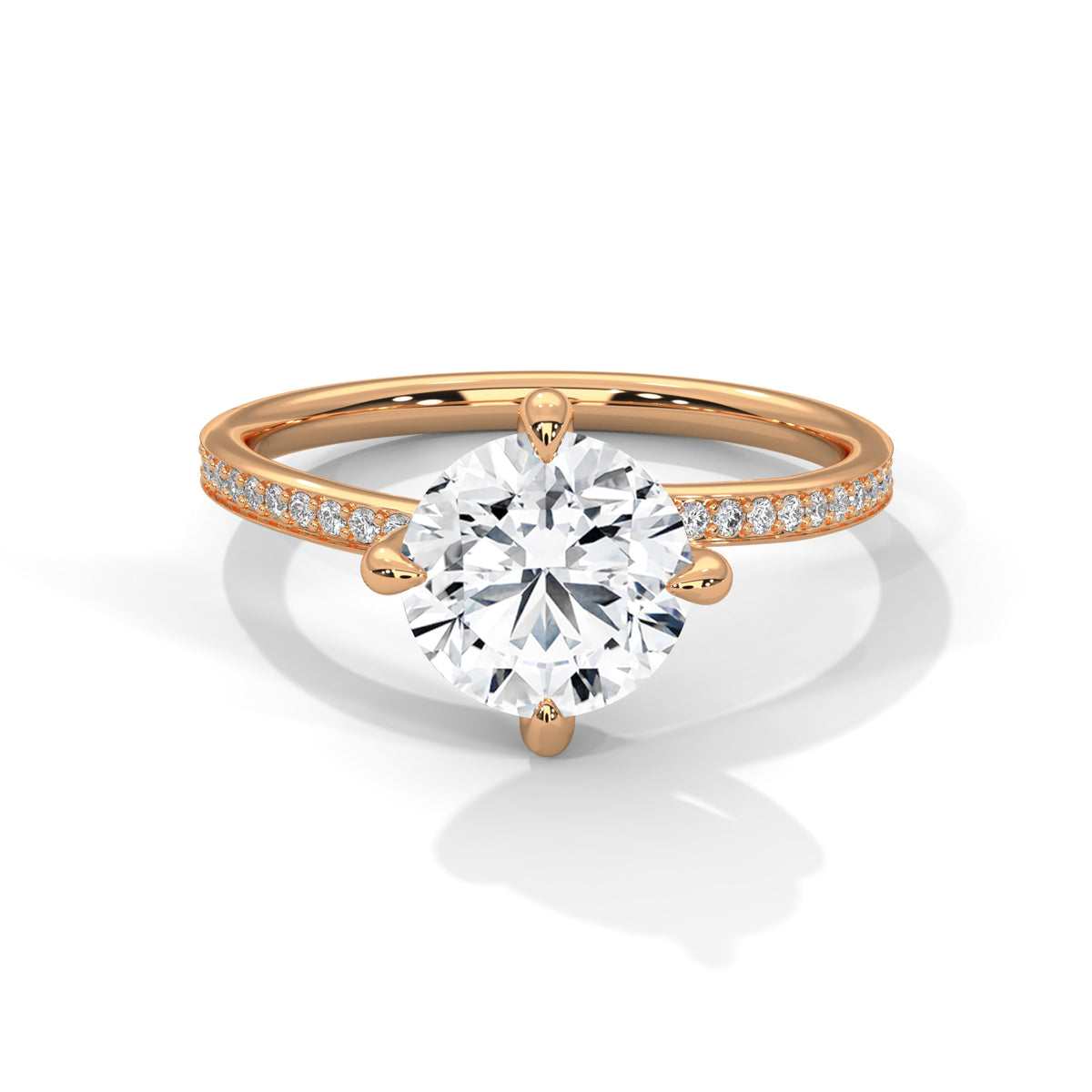 Rose gold ring with a large diamond and smaller diamonds on the band against a white background