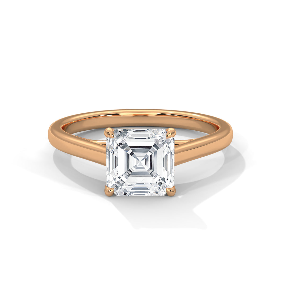 Rose gold ring with a large diamond on a white background