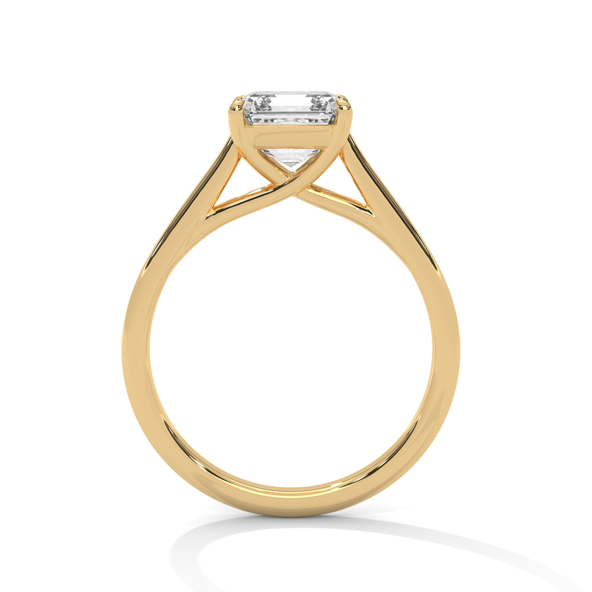 Gold ring with a diamond on a white background