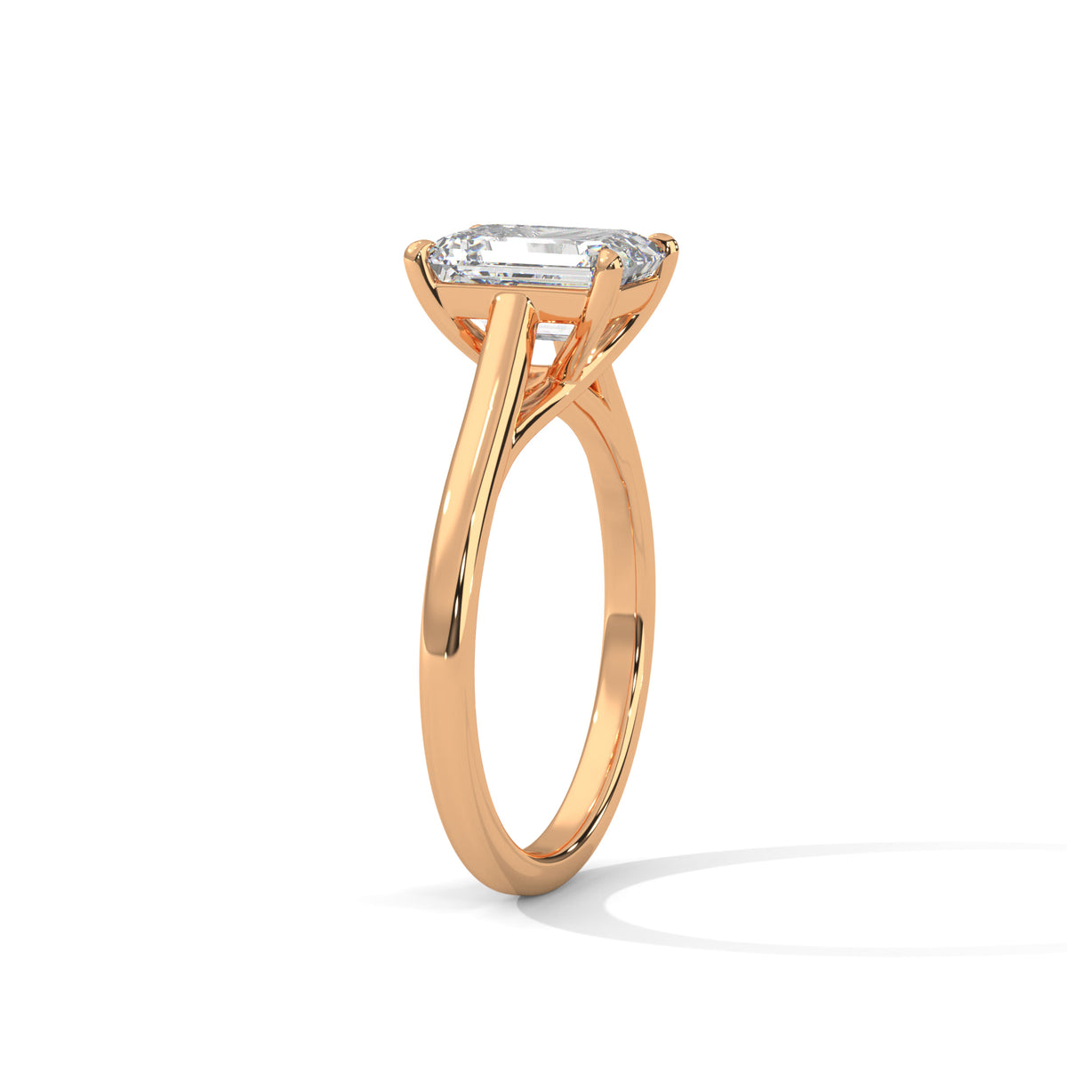 Rose gold ring with a diamond on a white background