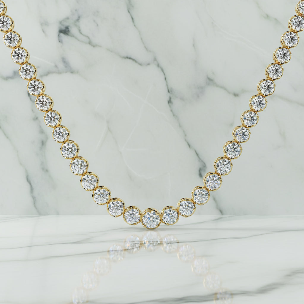 Gold necklace with clear gemstones on a beige background