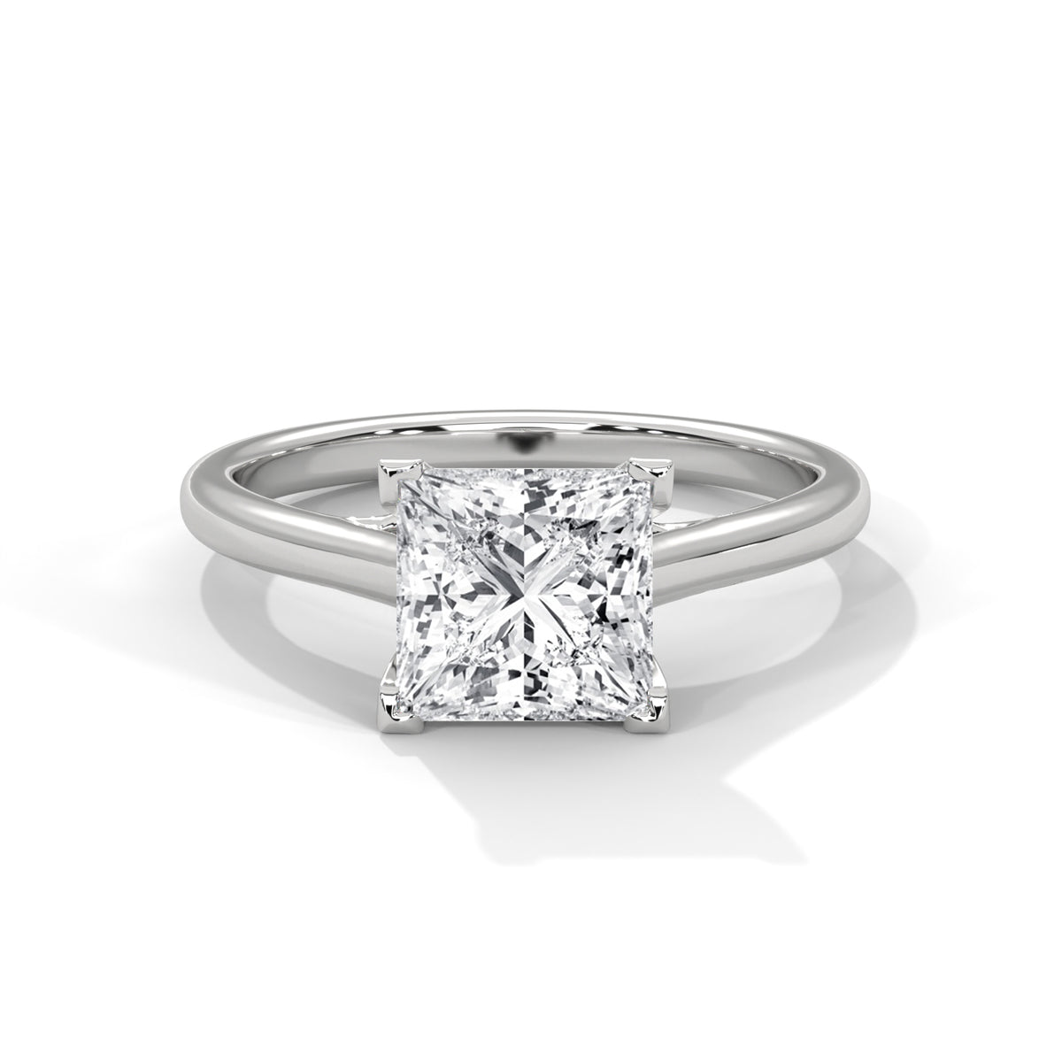 Diamond ring with a square-cut gemstone on a white background