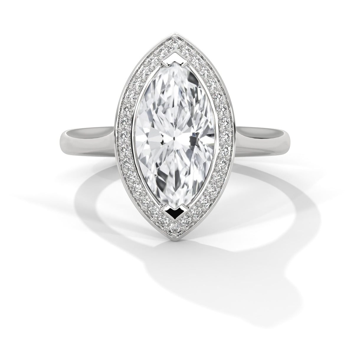 Diamond ring with marquise-shaped center stone on a white background