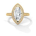 Gold ring with a large central diamond and smaller diamonds around on a white background