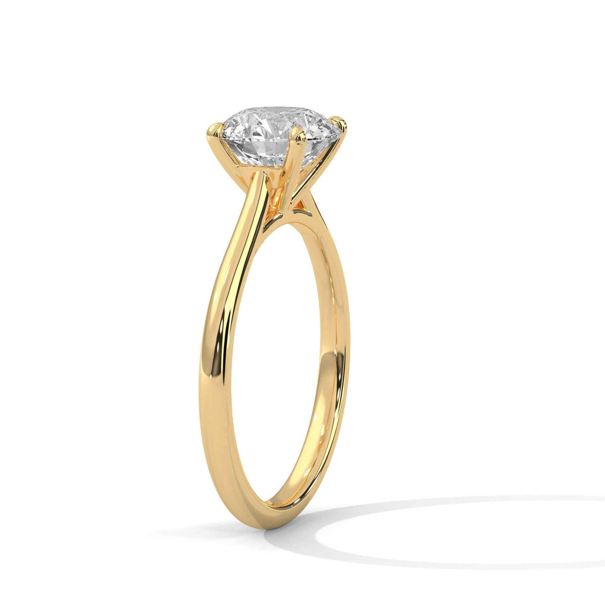 Gold ring with a diamond on a white background