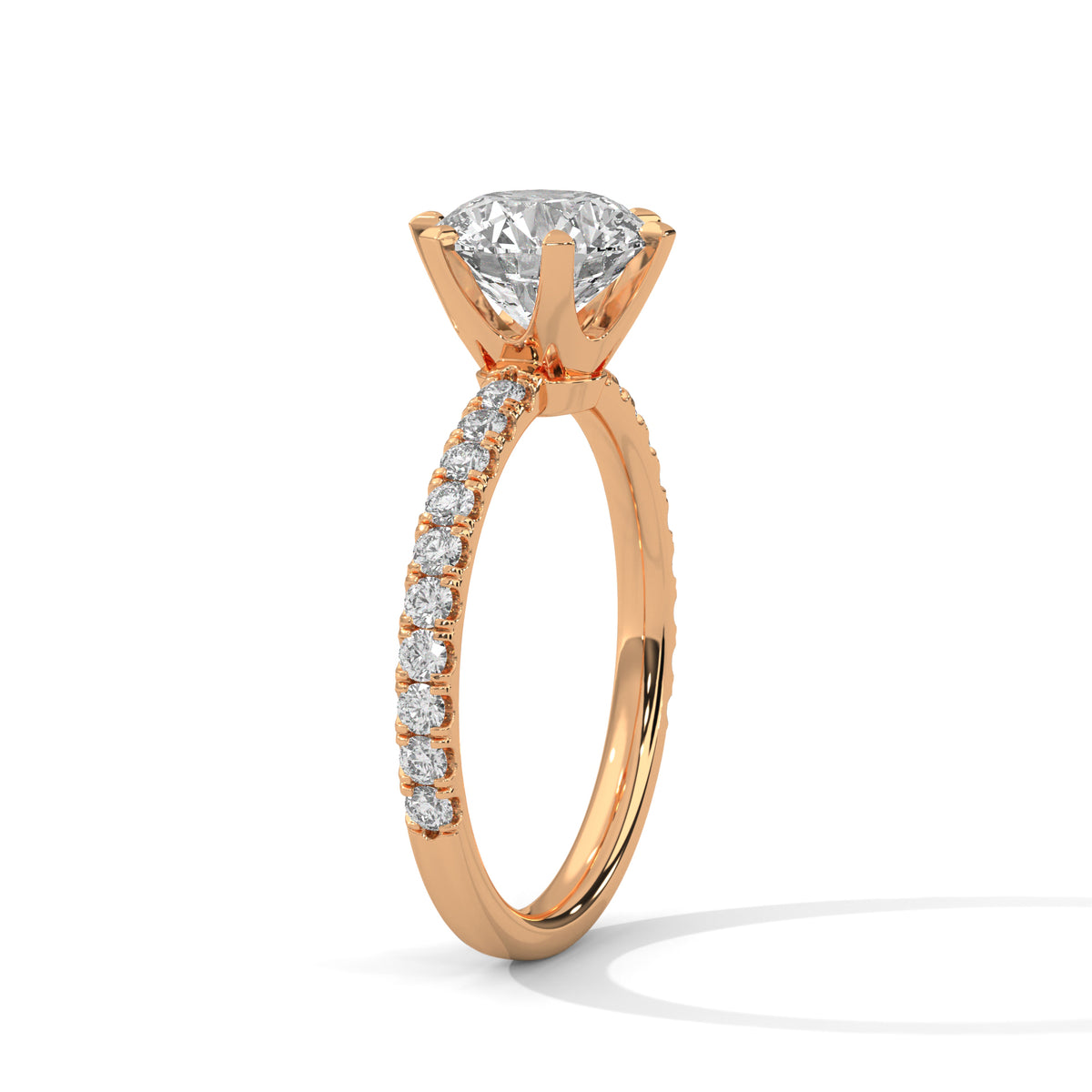 Rose gold ring with a diamond on a white background