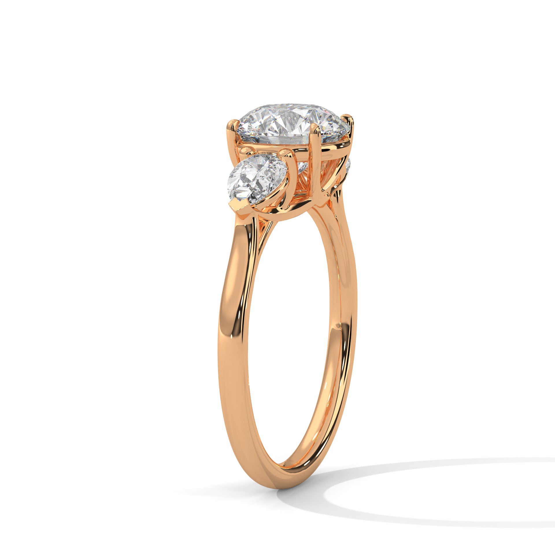 Three-Stone Round & Pear Diamond Engagement Ring