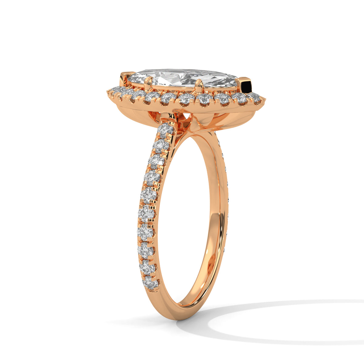 Rose gold ring with diamond accents on a white background