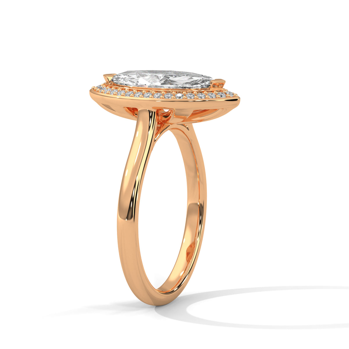 Rose gold ring with a diamond on a white background