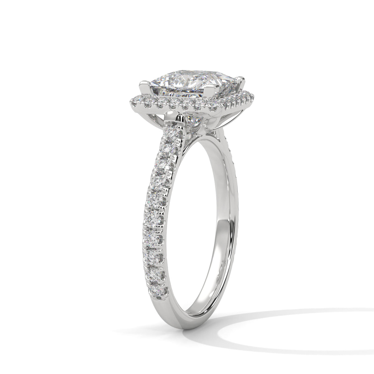 Diamond ring with a white gold band on a white background