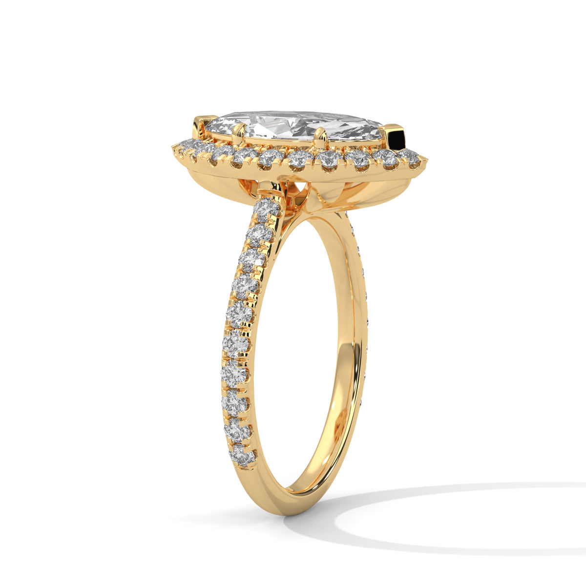 Gold ring with diamond accents on a white background