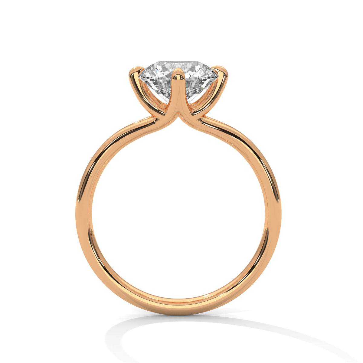 Rose gold ring with a diamond on a white background