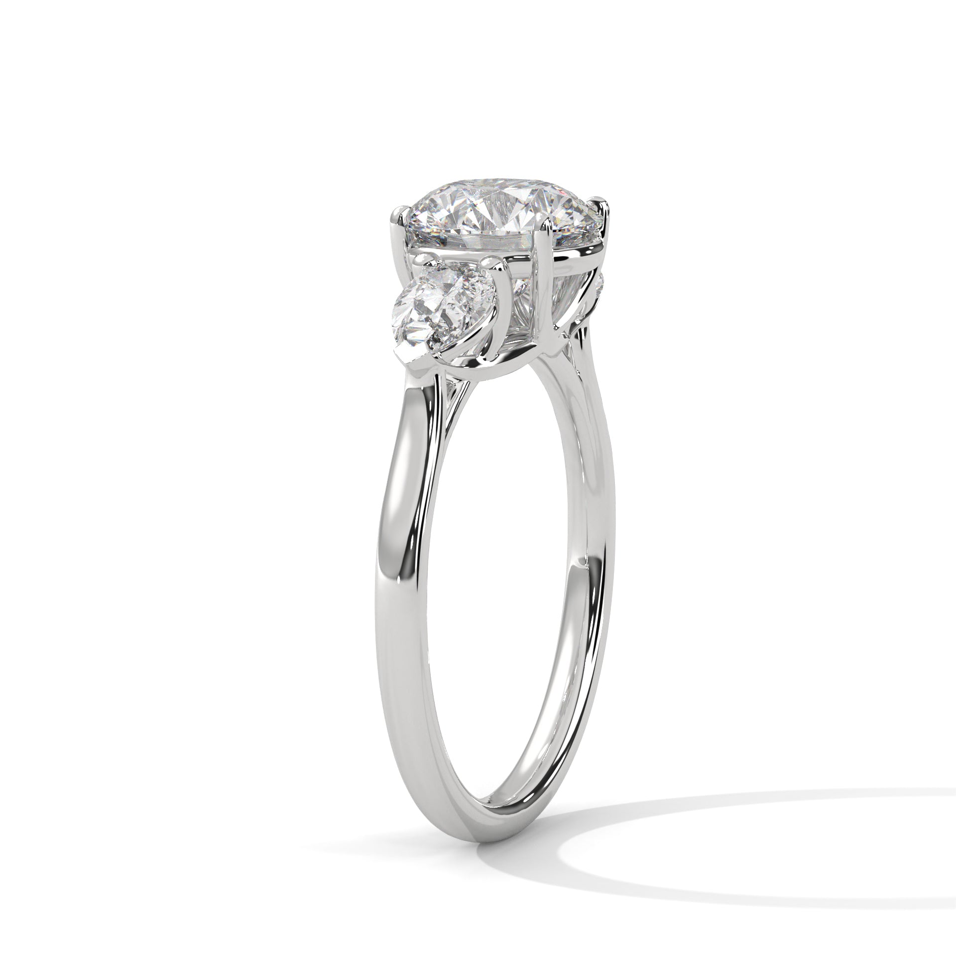 Three-Stone Round & Pear Diamond Engagement Ring