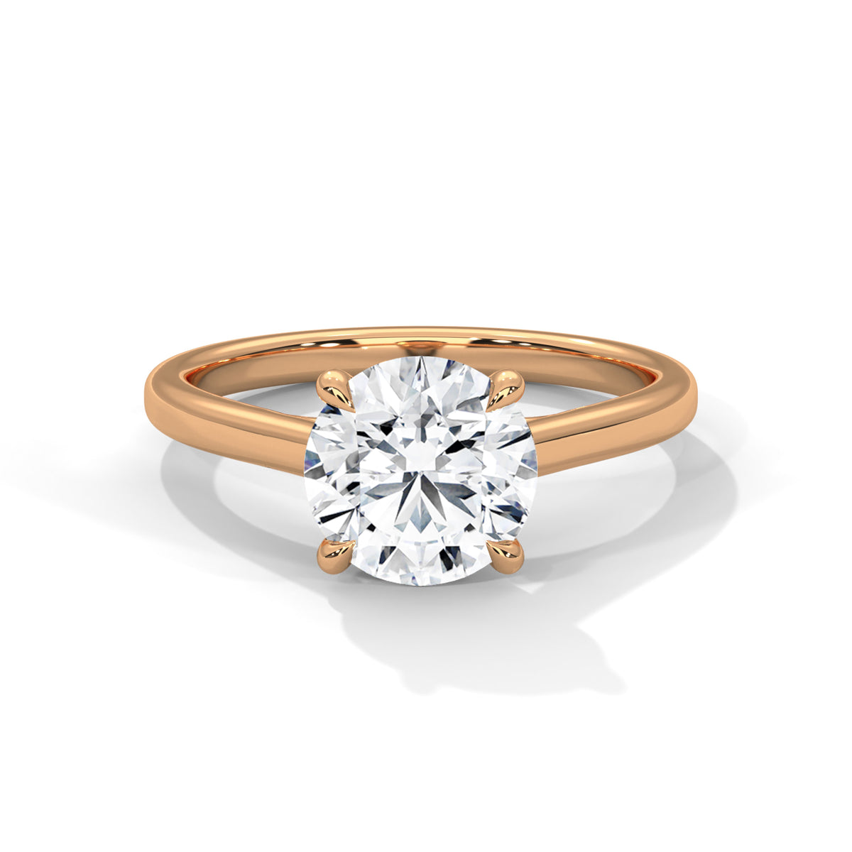 Rose gold ring with a large diamond on a white background