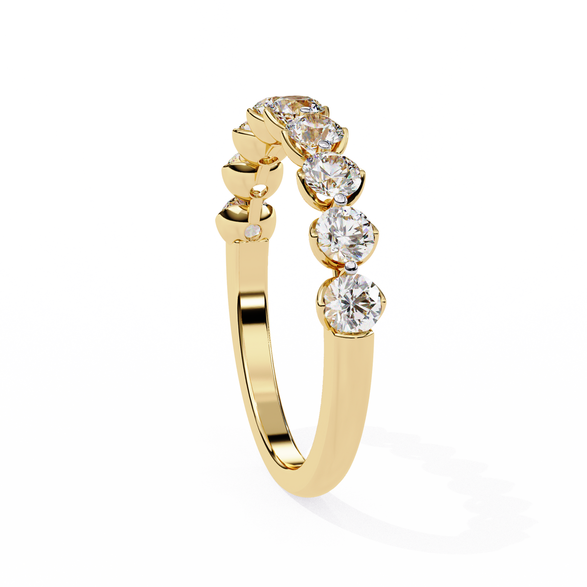 Gold ring with diamond stones on a white background