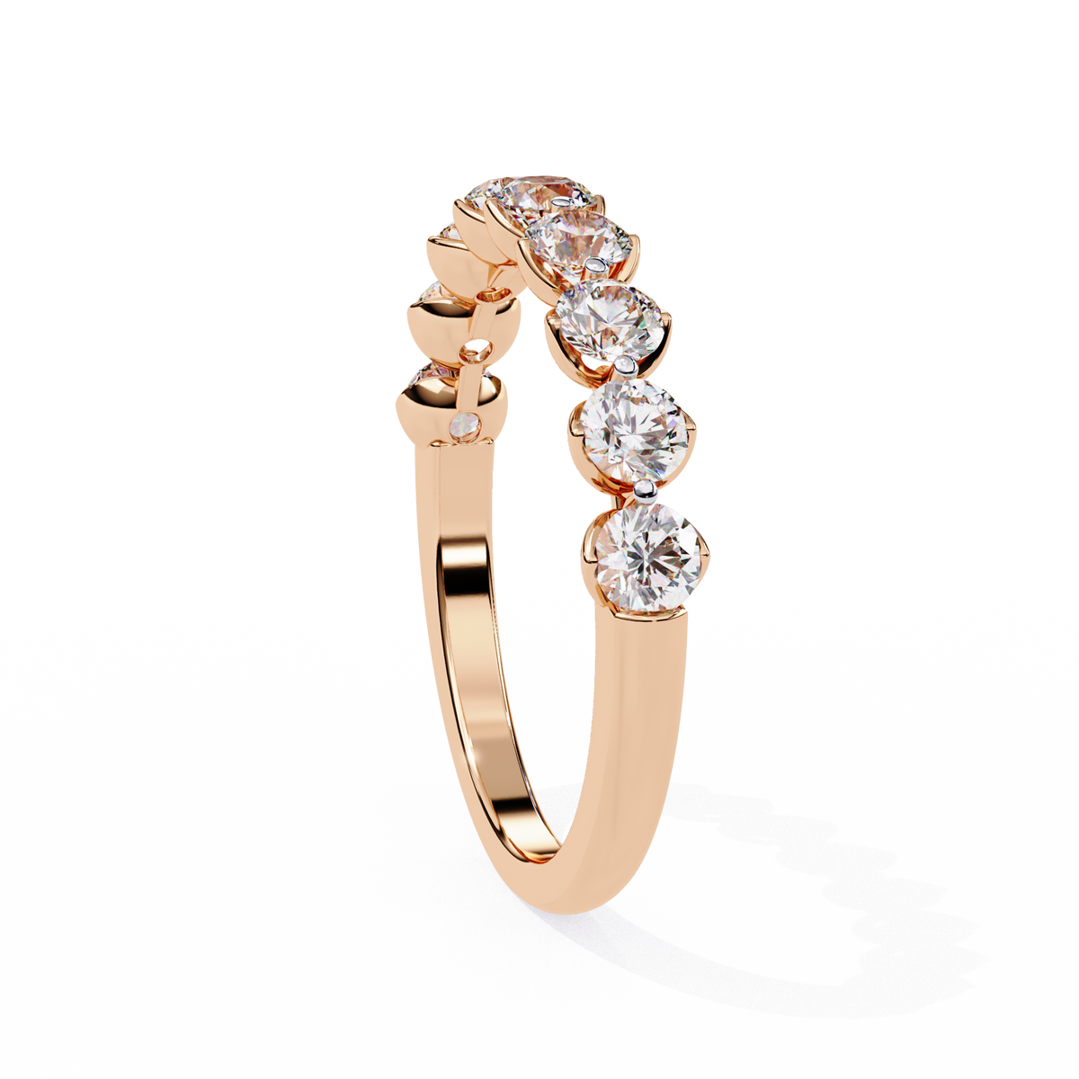 Rose gold ring with diamonds on a white background
