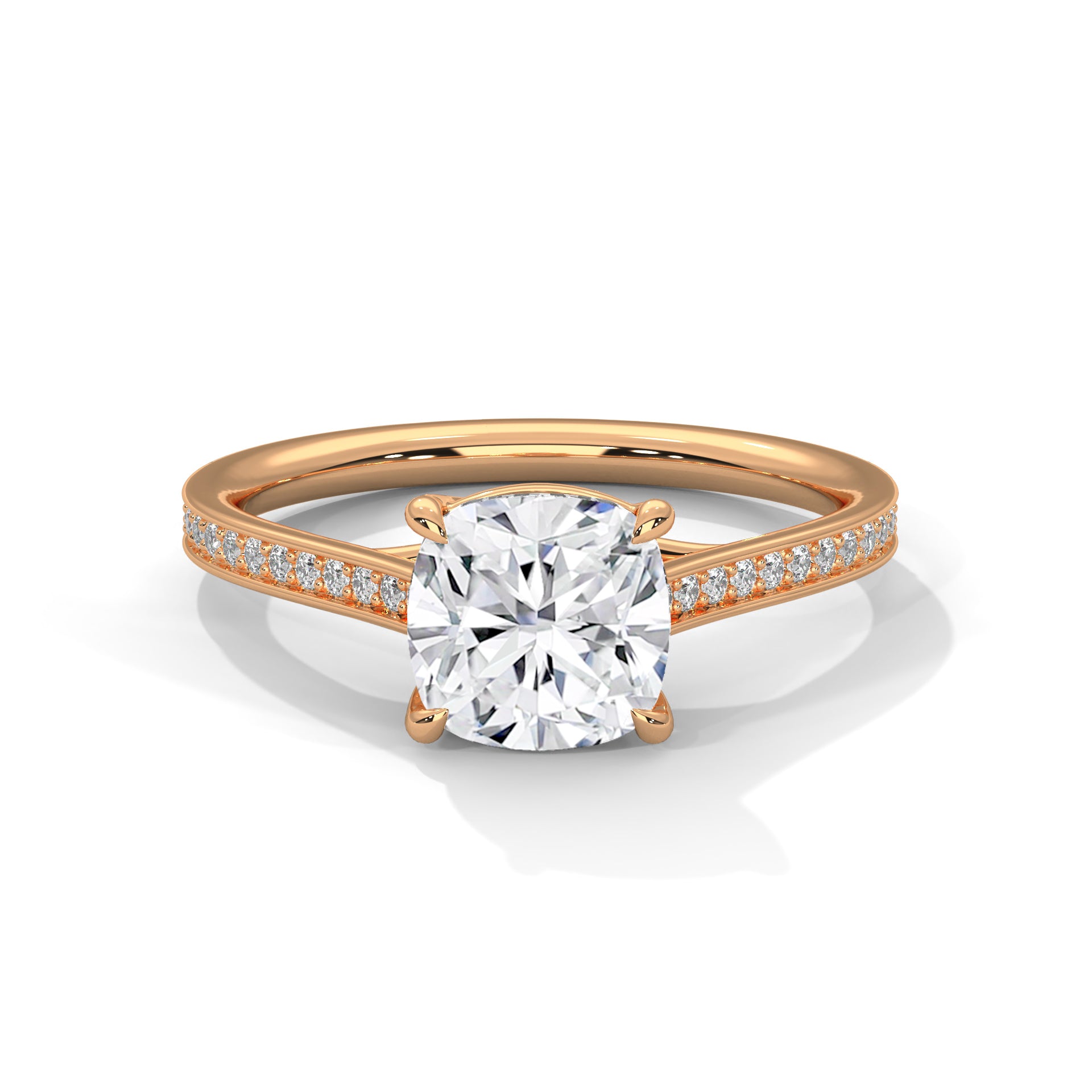 Gold ring with a large diamond and smaller diamonds on the band against a white background