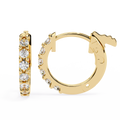Gold hoop earrings with clear gemstones on a white background