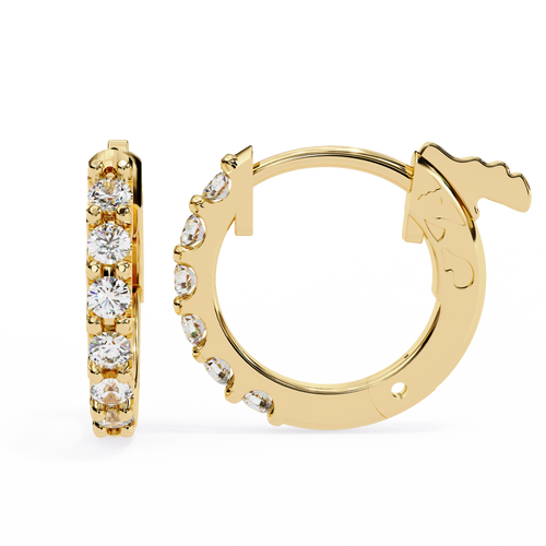 Gold hoop earrings with clear gemstones on a white background