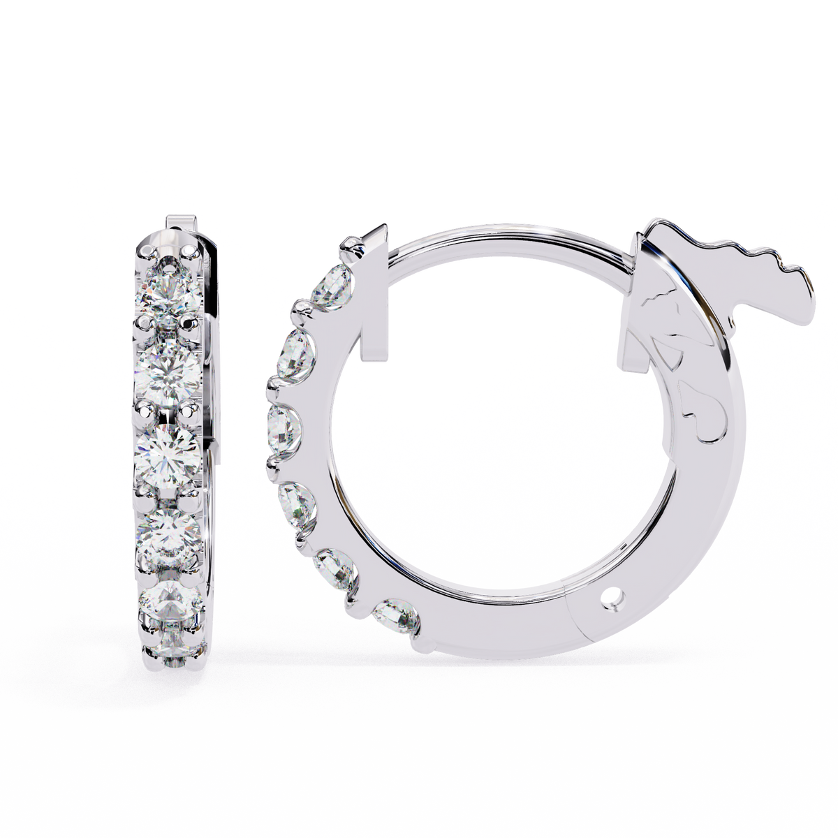 Silver hoop earrings with clear gemstones on a white background