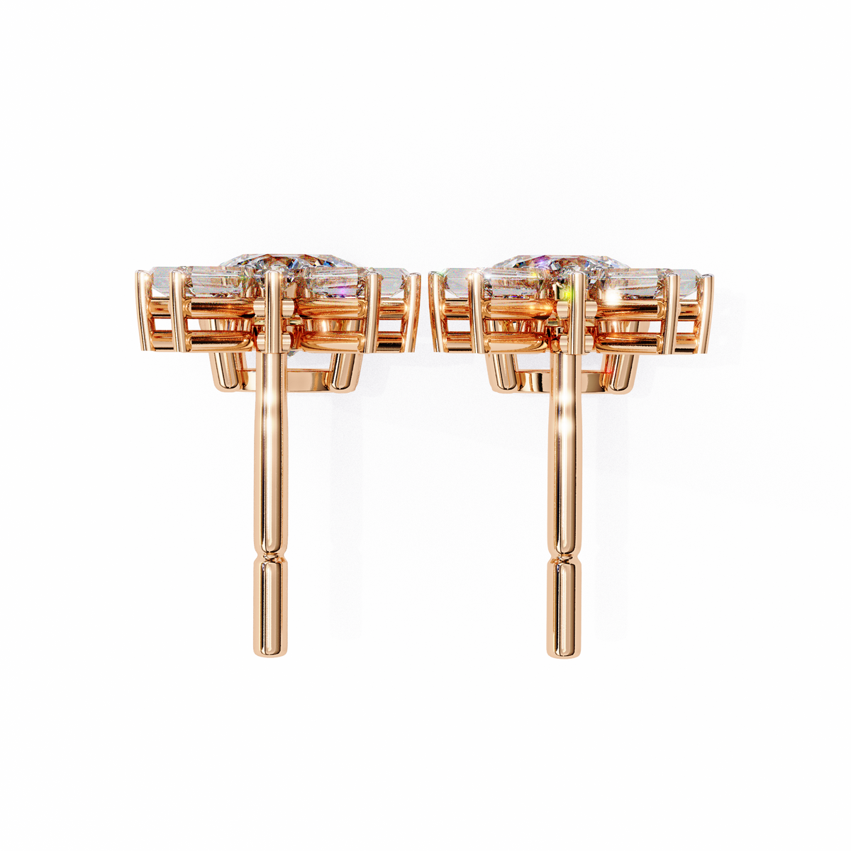 Rose gold earrings with gemstones on a white background