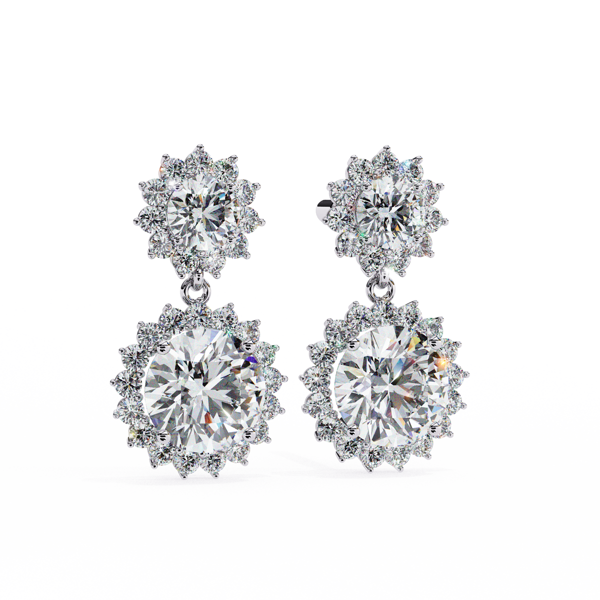 Pair of diamond earrings on a white background
