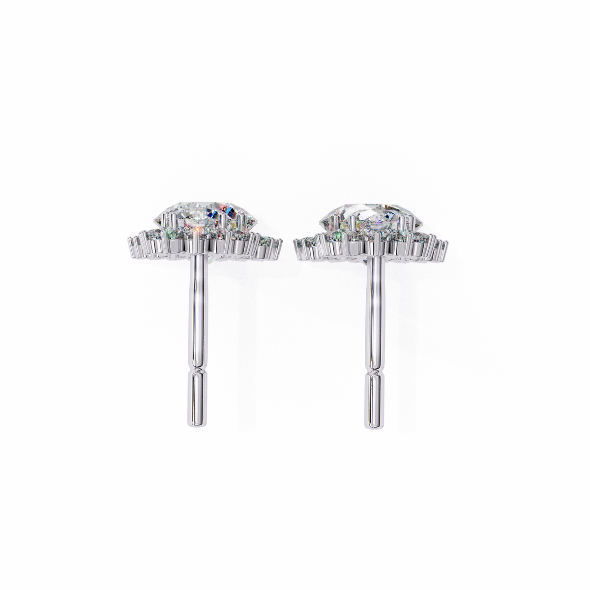 Pair of silver earrings with gemstones on a white background
