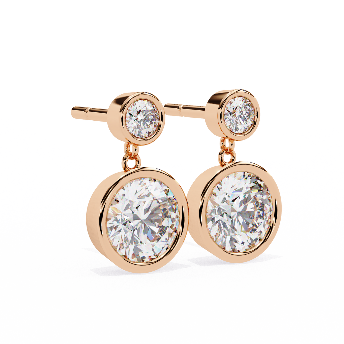 Rose gold earrings with clear gemstones on a white background