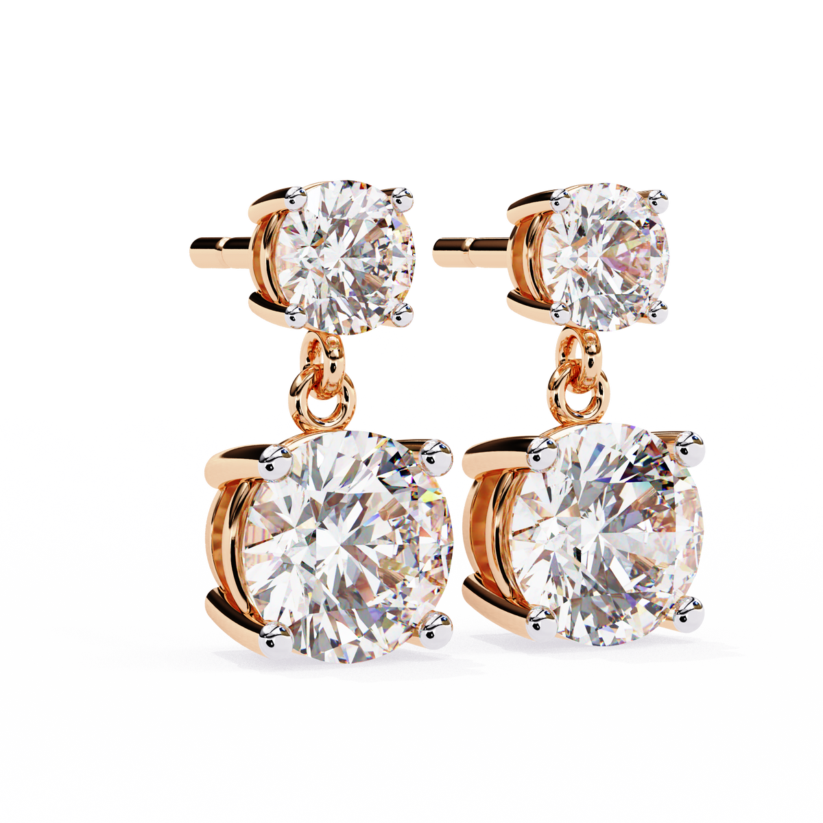 Rose gold earrings with large clear gemstones on a white background