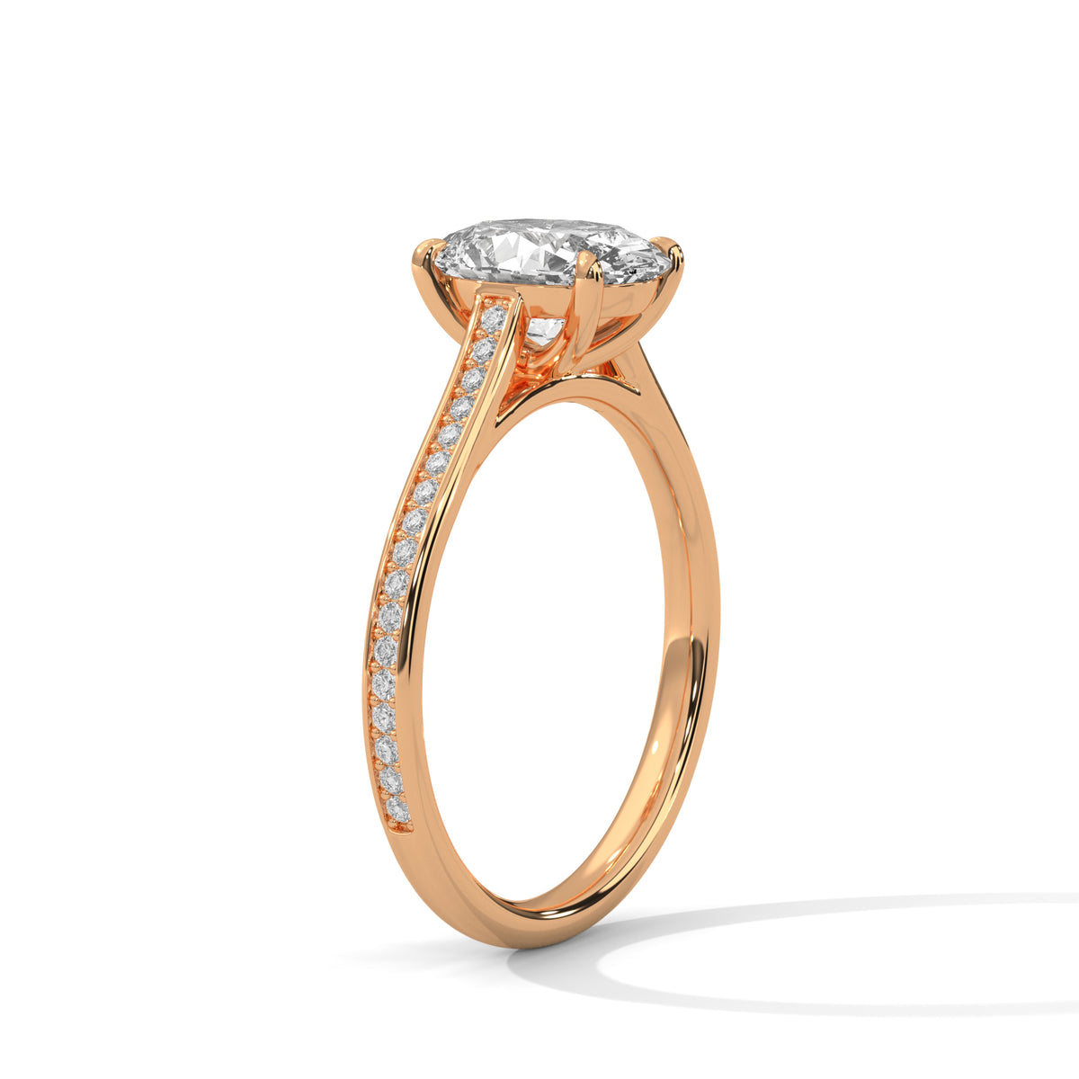 Rose gold ring with a large diamond and smaller diamonds on the band against a white background