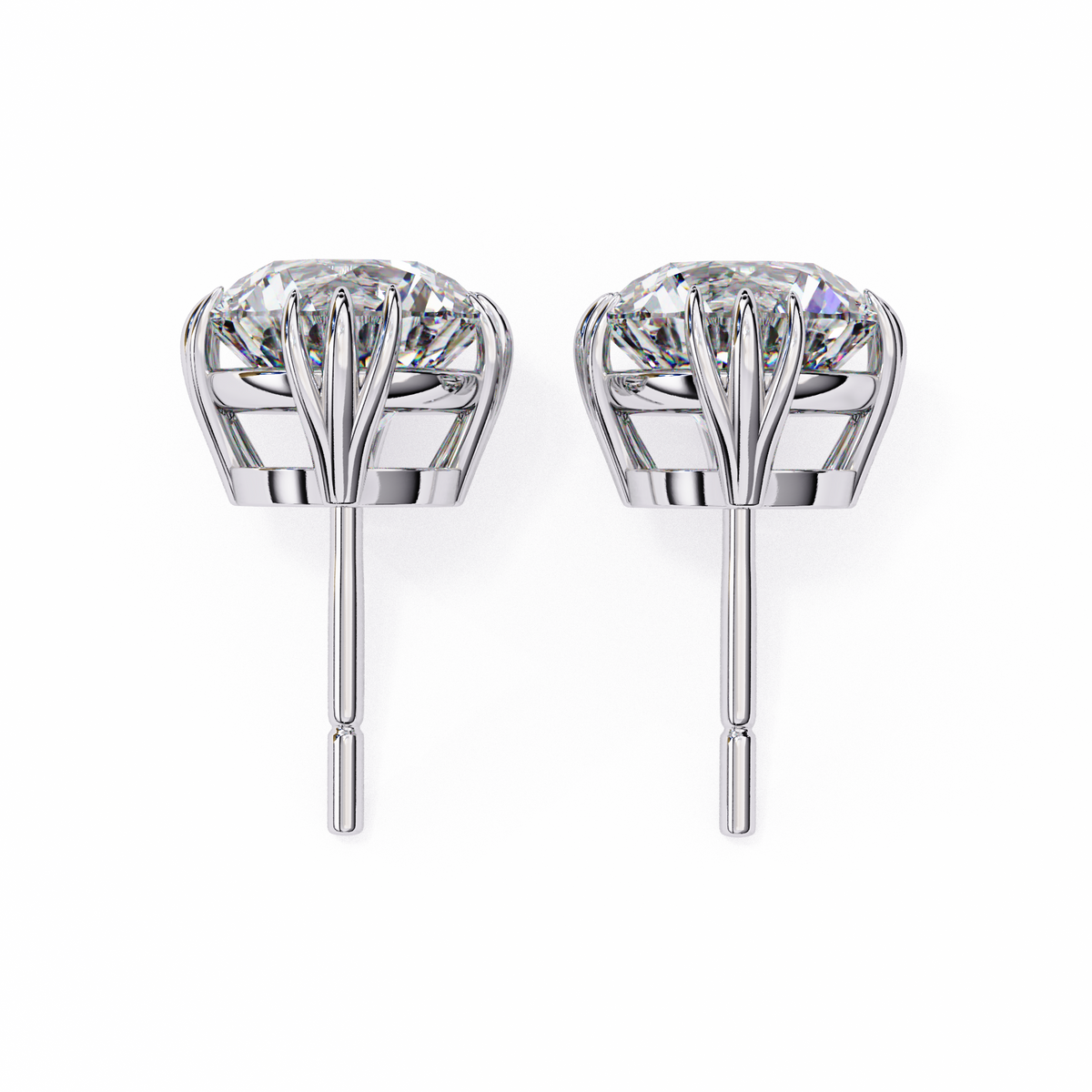 Pair of silver stud earrings with clear gemstones on a white background