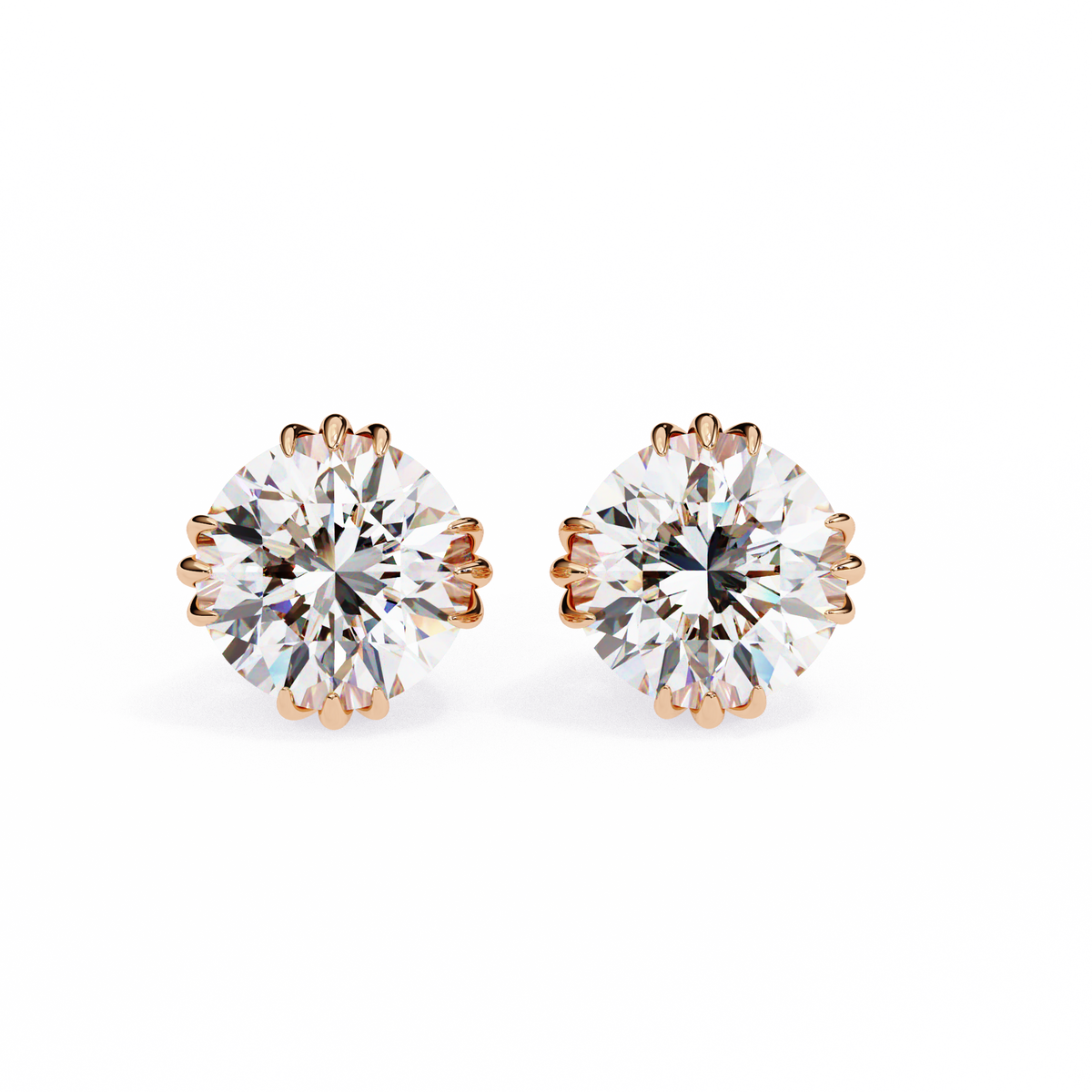 Pair of diamond stud earrings on a white background