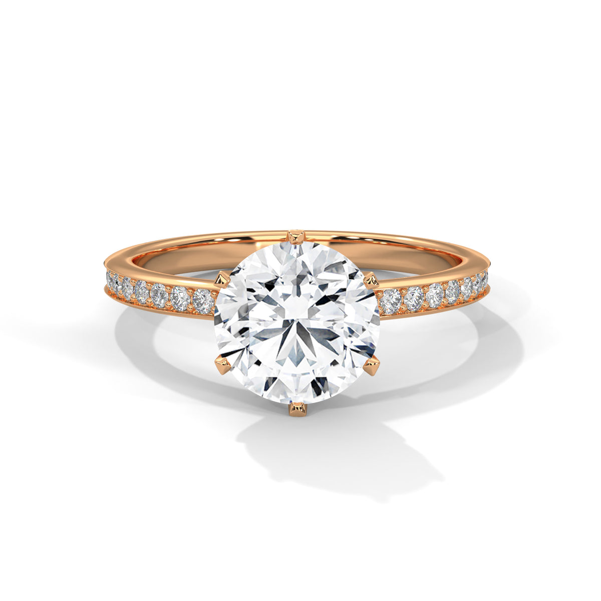Rose gold ring with a large diamond and smaller diamonds on the band against a white background