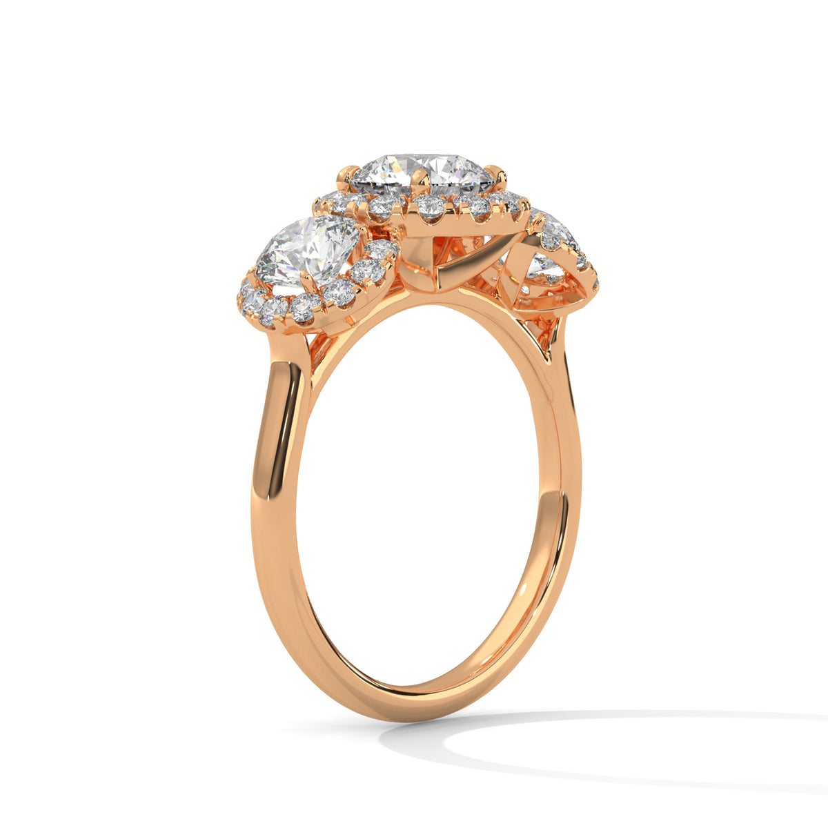 Rose gold ring with diamonds on a white background