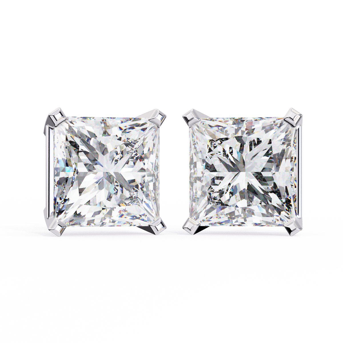Pair of diamond stud earrings on a white background