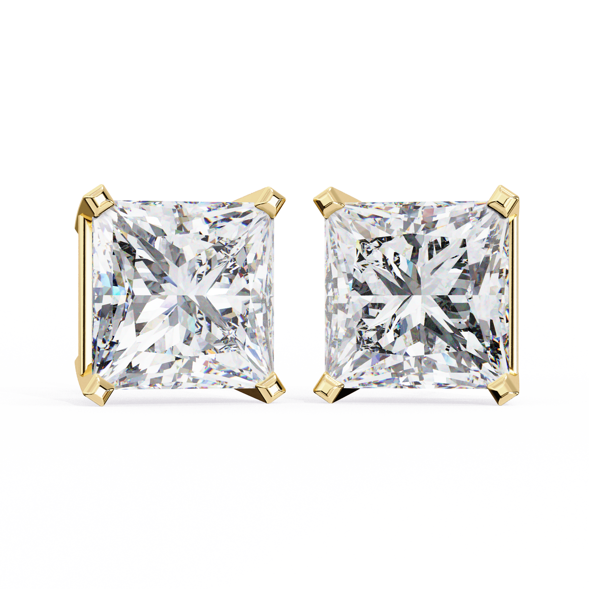 Pair of diamond stud earrings with gold prongs on a white background