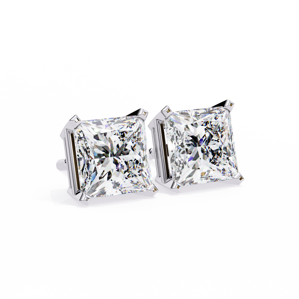 Pair of diamond stud earrings on a white background