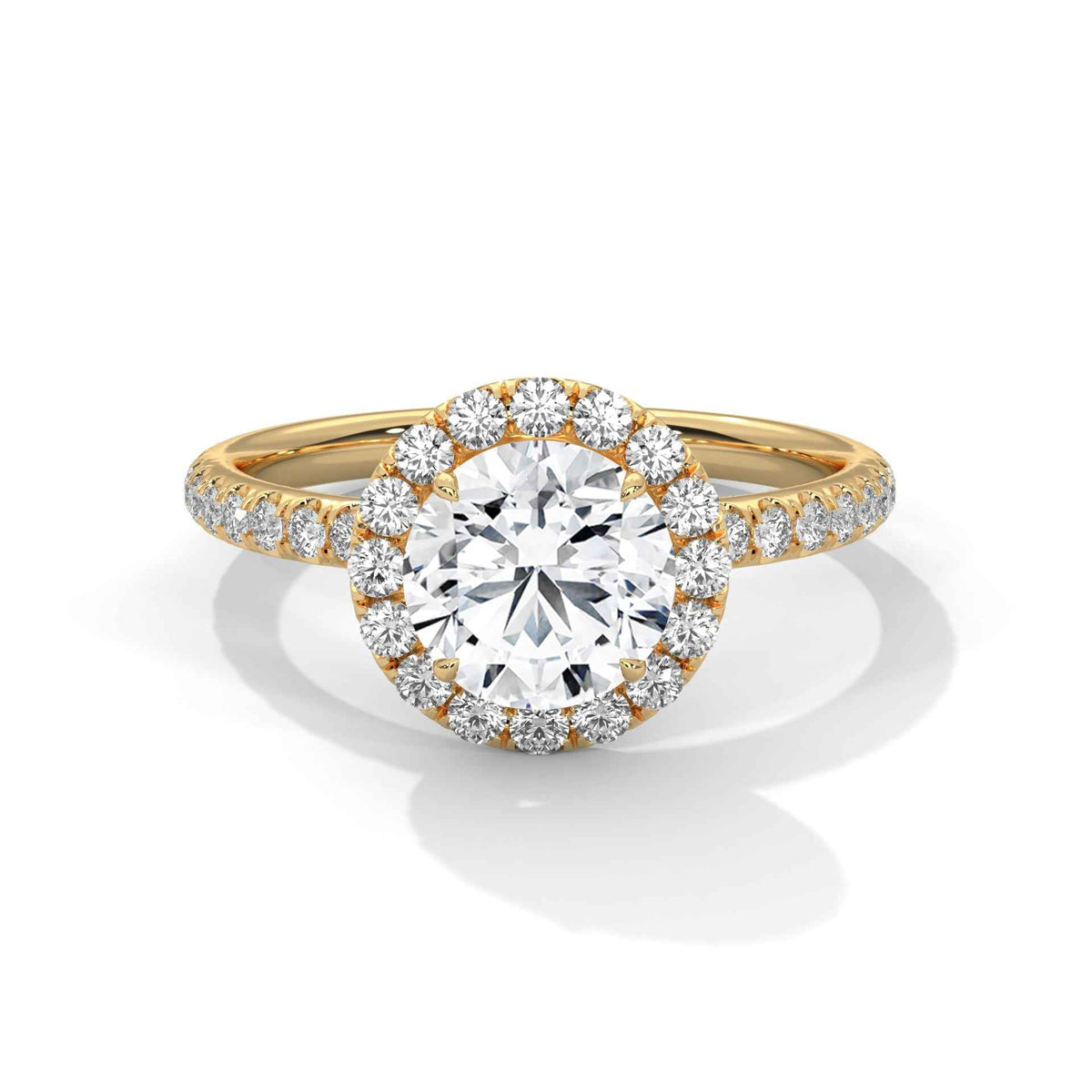 Rose gold diamond ring with a clear gemstone on a white background
