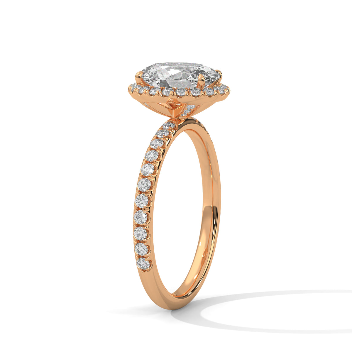 Rose gold ring with a large diamond and smaller diamonds on the band against a white background