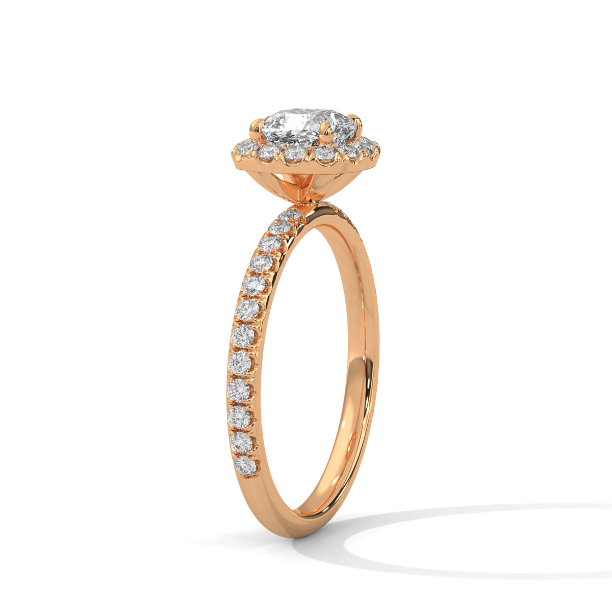 Rose gold ring with diamonds on a white background